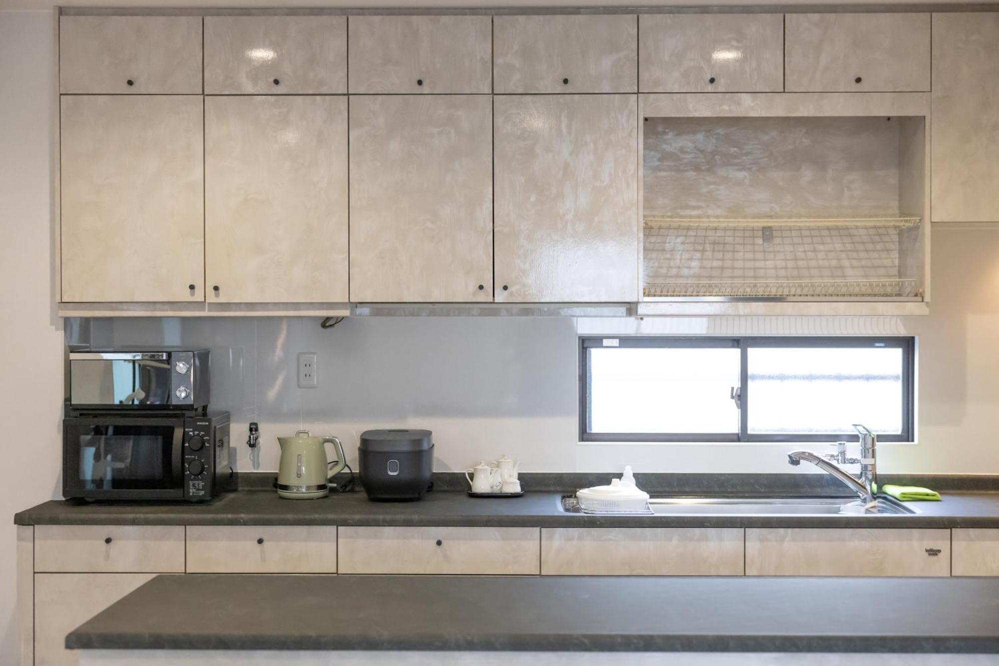 豊月荘 Toyotsuki Apartment Osaka Bagian luar foto
